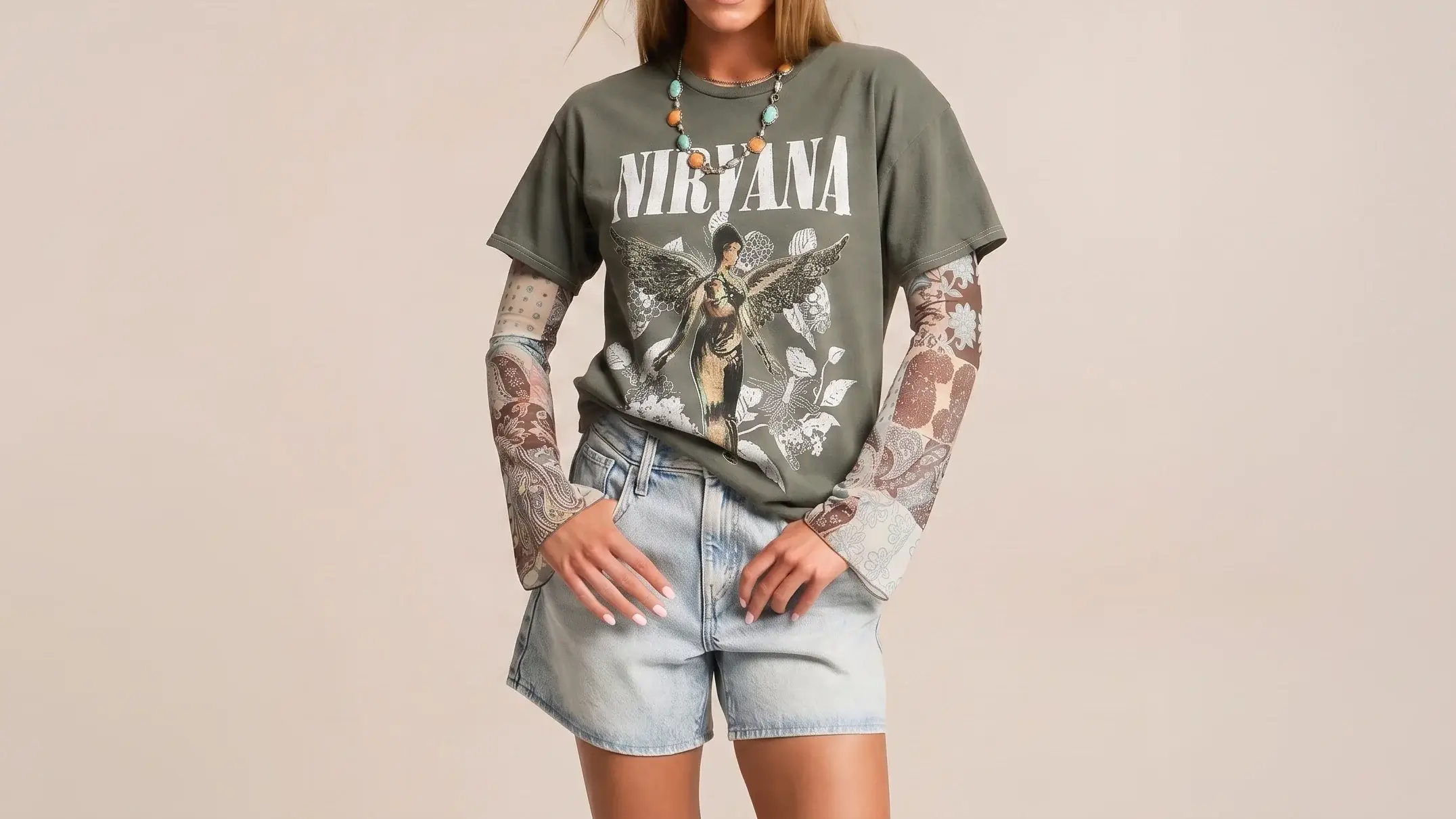 Model wearing a vintage-inspired band tee with a retro graphic design